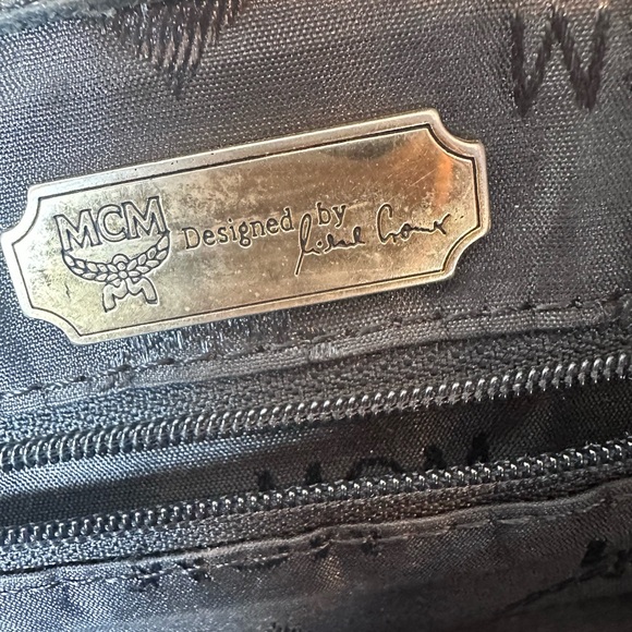 MCM Black Leather Drawstring Shoulder Backpack with Gold Accents - Picture 10 of 11